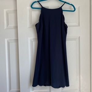 Scallop hemmed navy dress